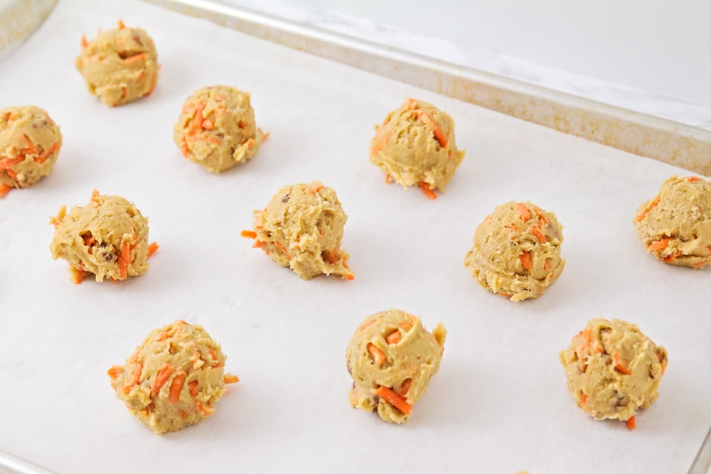 Carrot cake cookies in dough balls ready for baking.