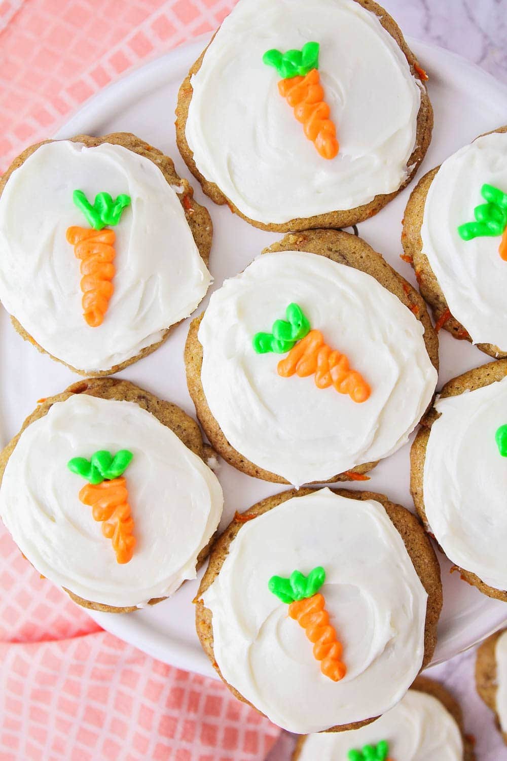 Carrot Cake Cookie Recipe topped with cream cheese frosting.