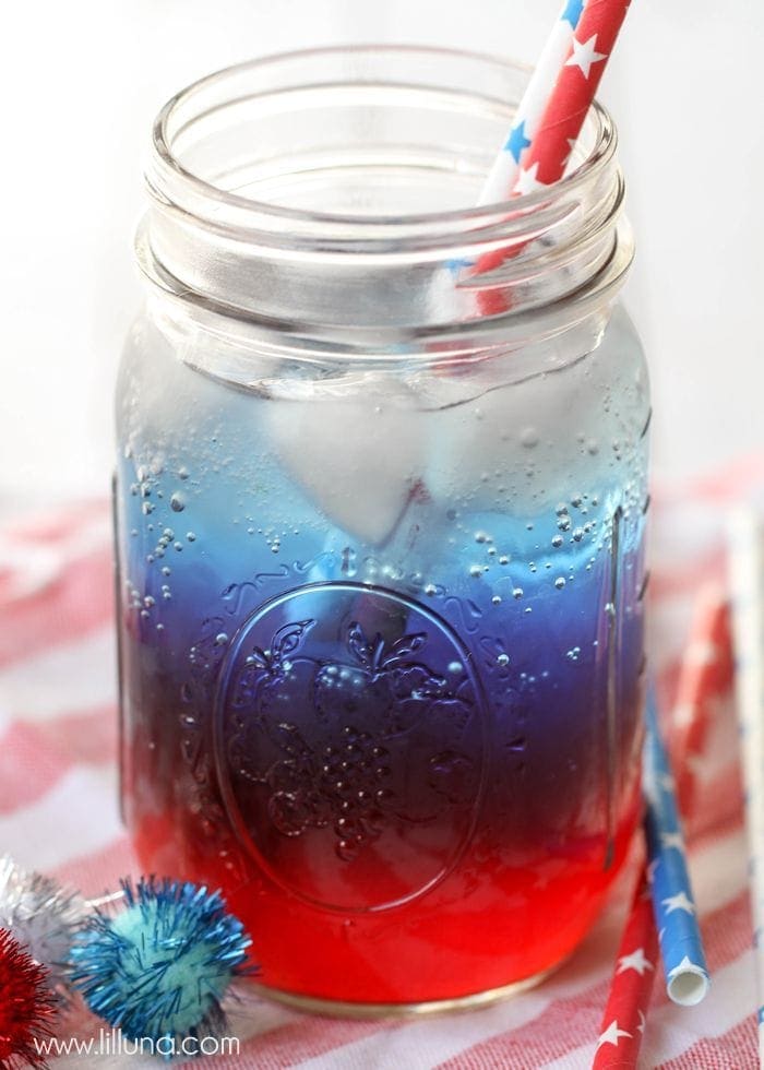 A delicious layered Patriotic Drink in a mason jar