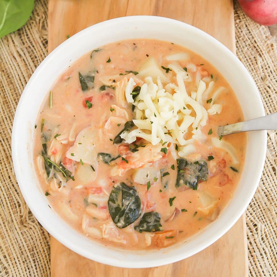 Chicken Florentine Soup in white bowl