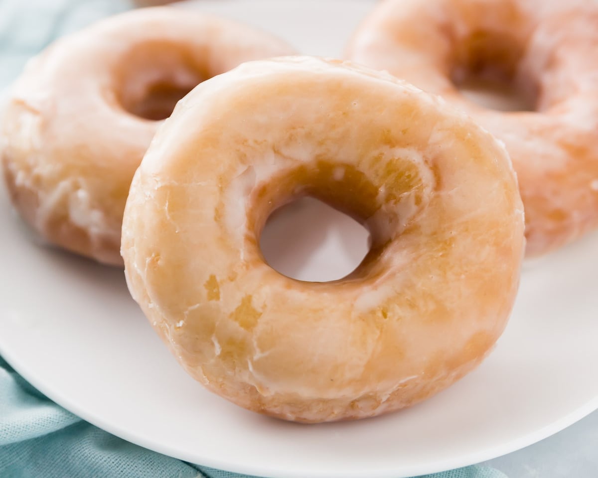 Closeup of donuts on a white plate