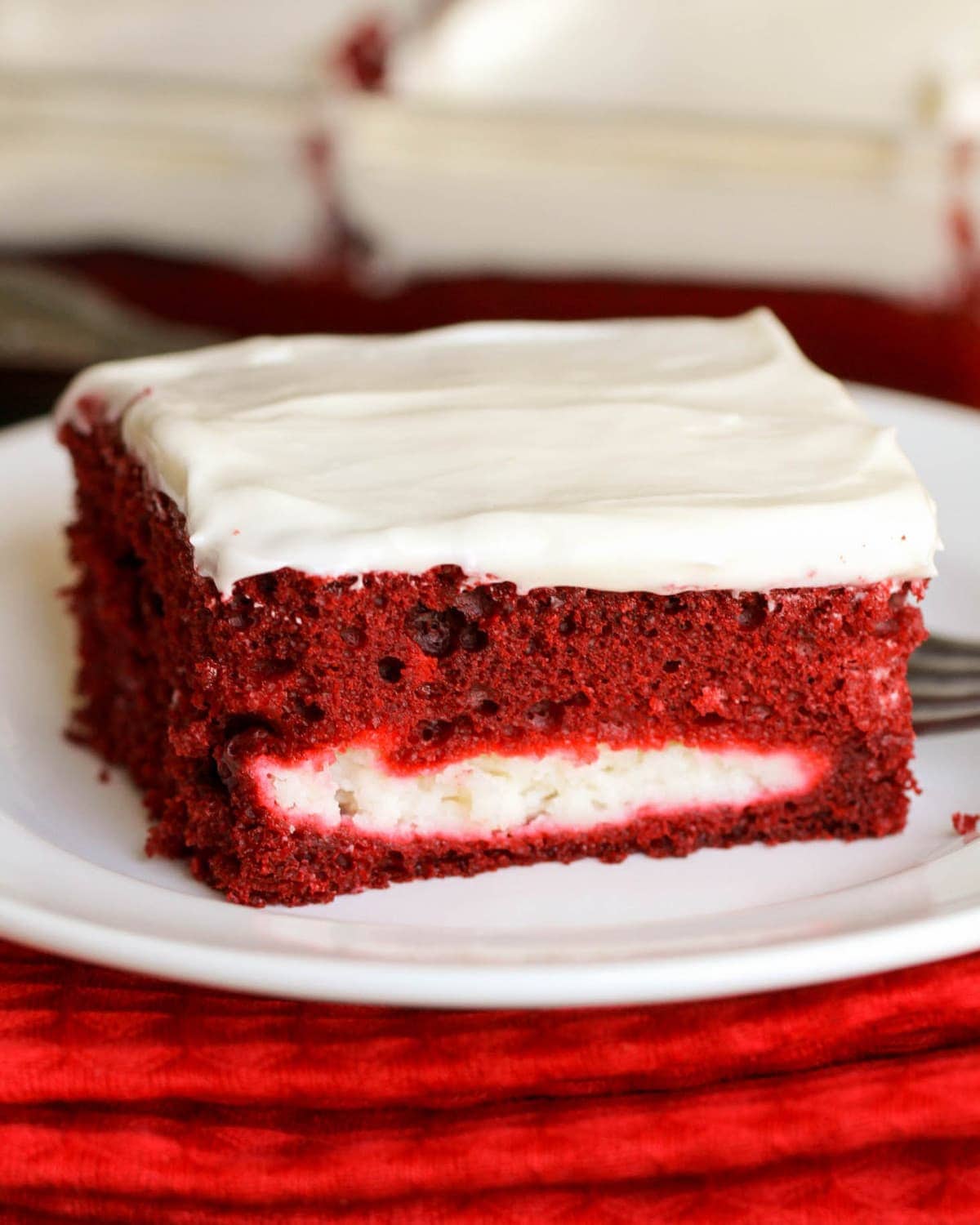 Red Velvet Cheesecake Cake on a white plate