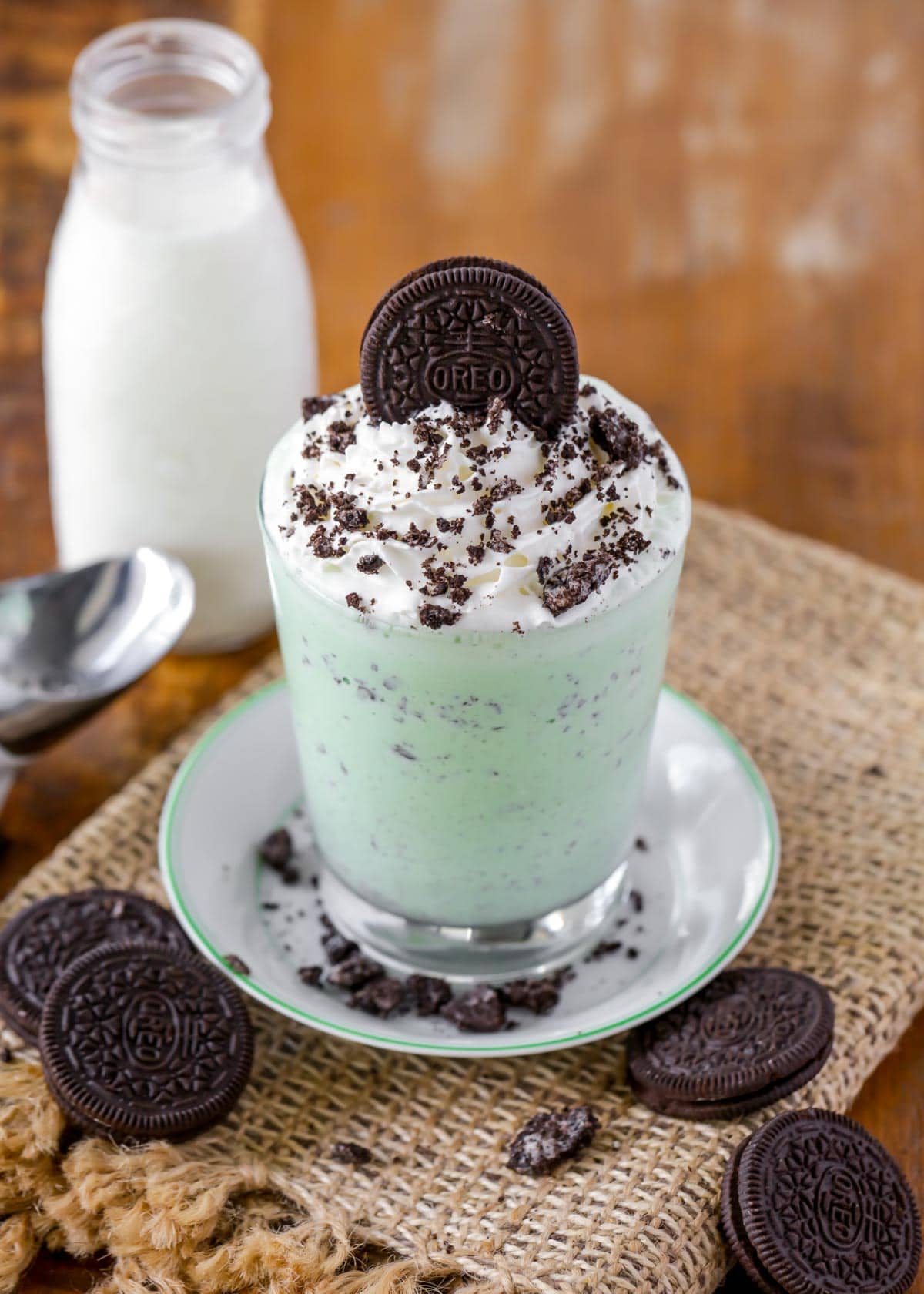 Mint Milkshake topped with whipped cream and an Oreo