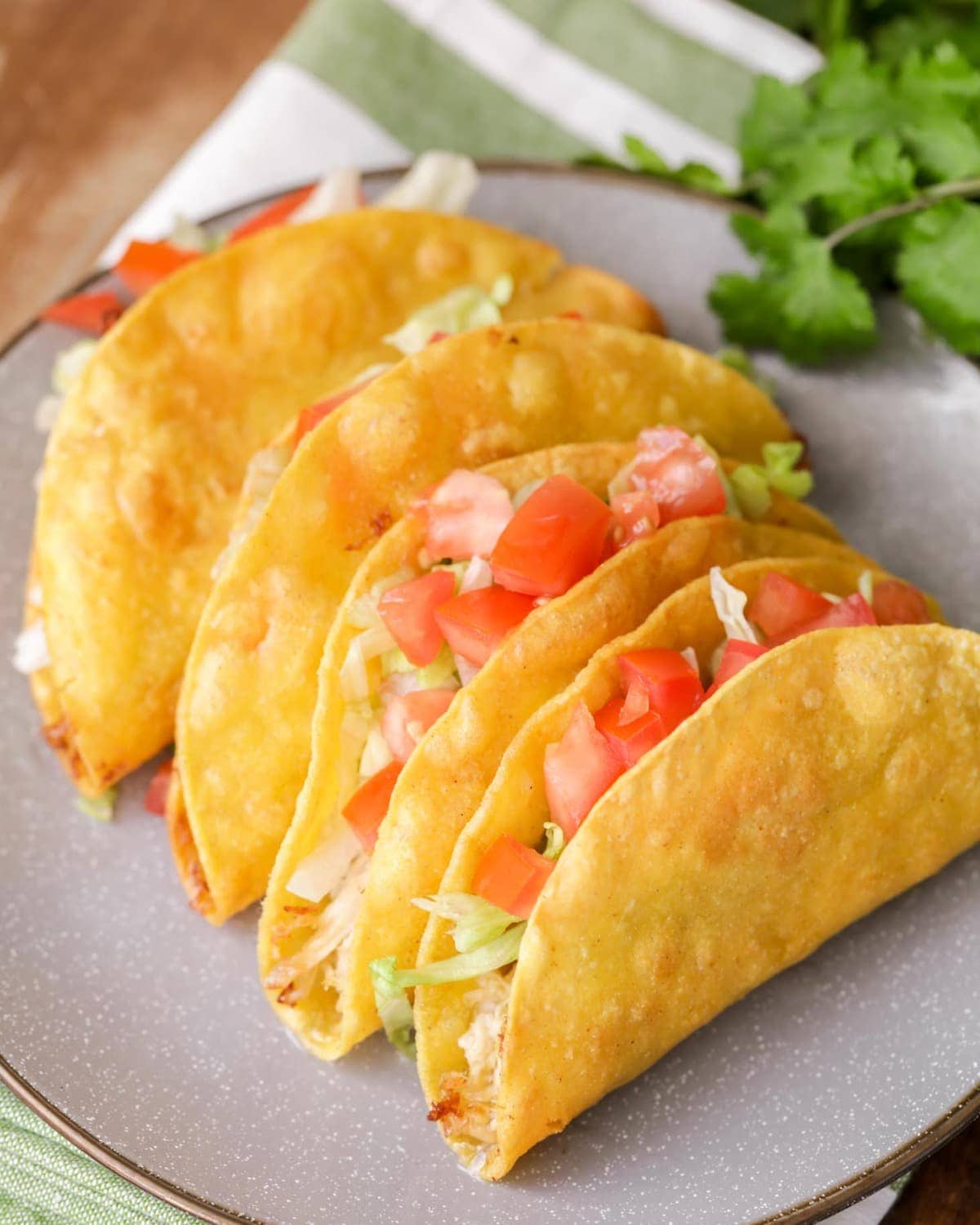 Easy Chicken Tacos recipe - tacos on gray plate