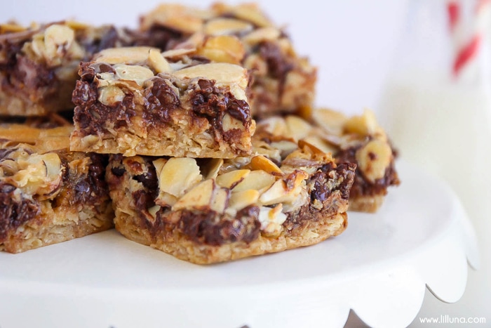 Almond Toffee Bars stacked on a cake stand