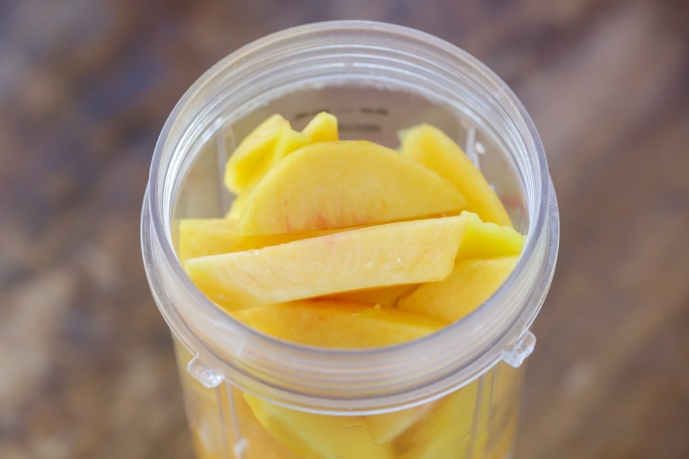 Cut up mangoes in blender