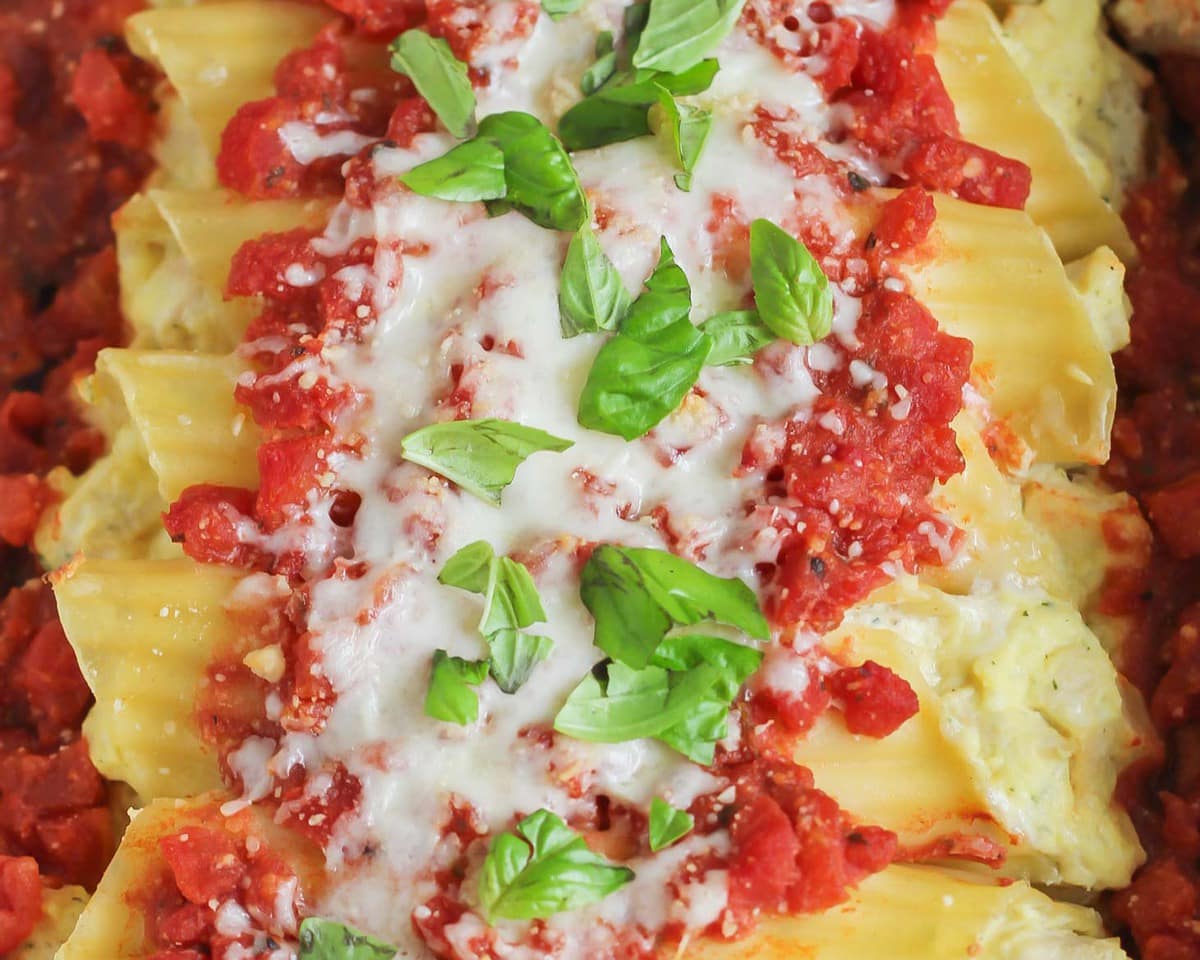 Cheese and chicken manicotti in baking dish