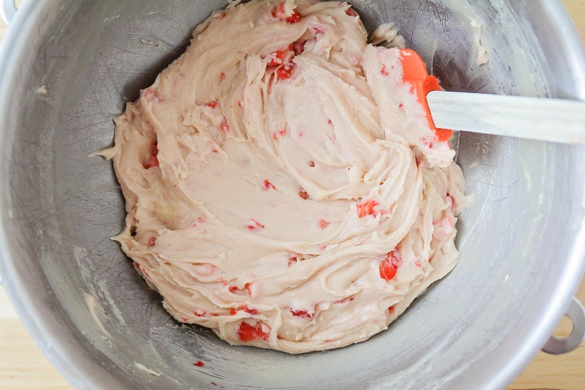 Cake batter filled with chopped strawberries.