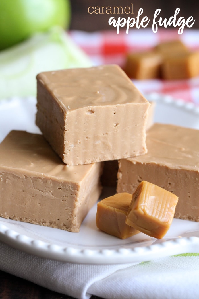 caramel apple fudge stacked on a white plate