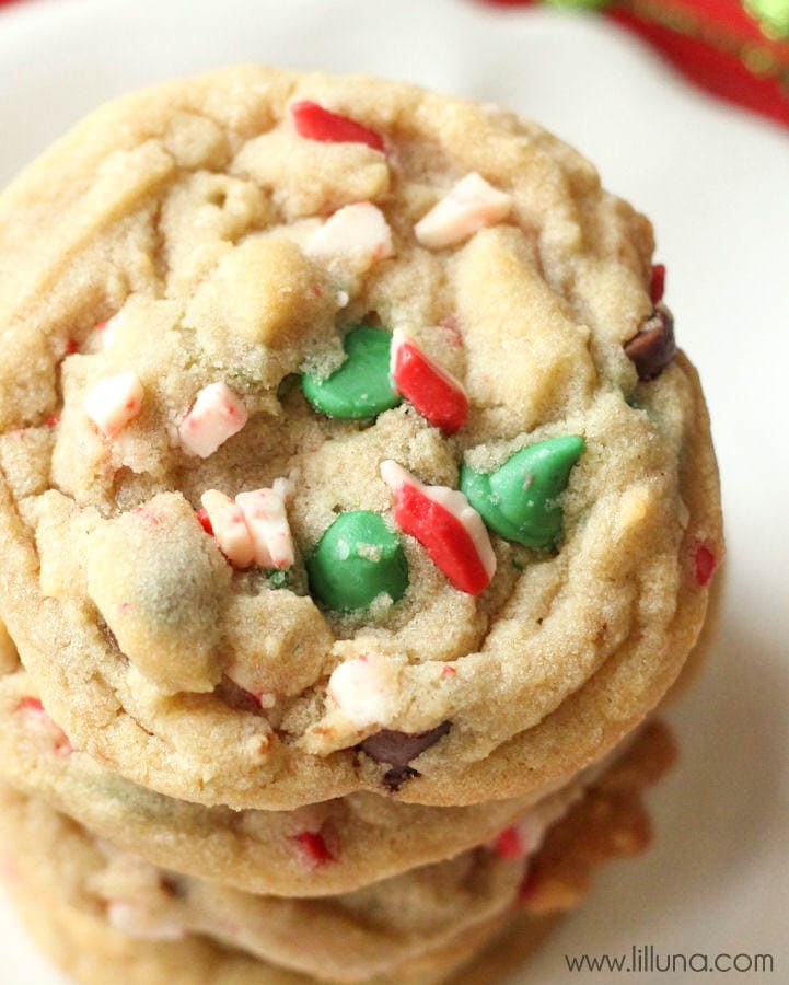 Close up of stacked Peppermint Chocolate Chip Cookies on a Christmas plate