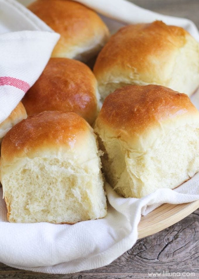 Christmas side dishes - several yeast dinner rolls in a cloth.