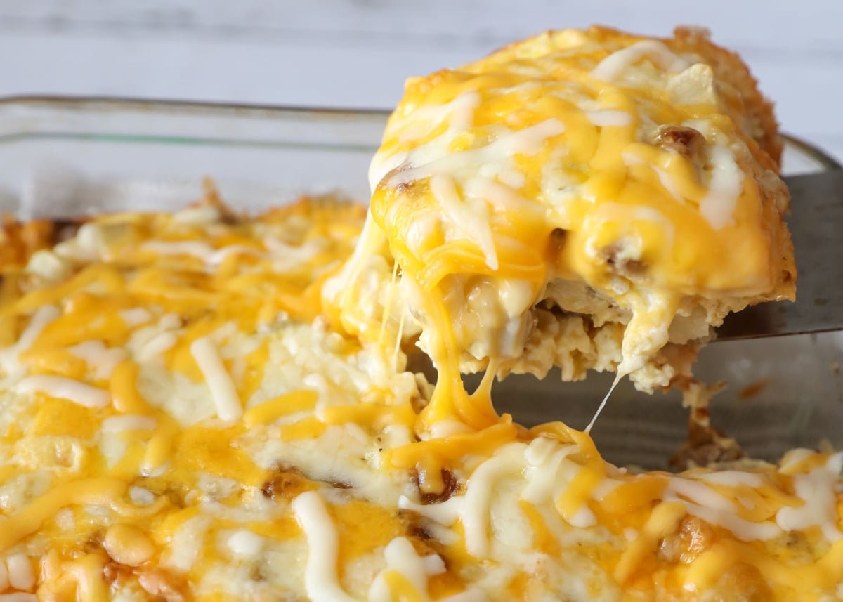 5 Ingredient Recipes - Close up of cheesy breakfast potato casserole served in a casserole dish.