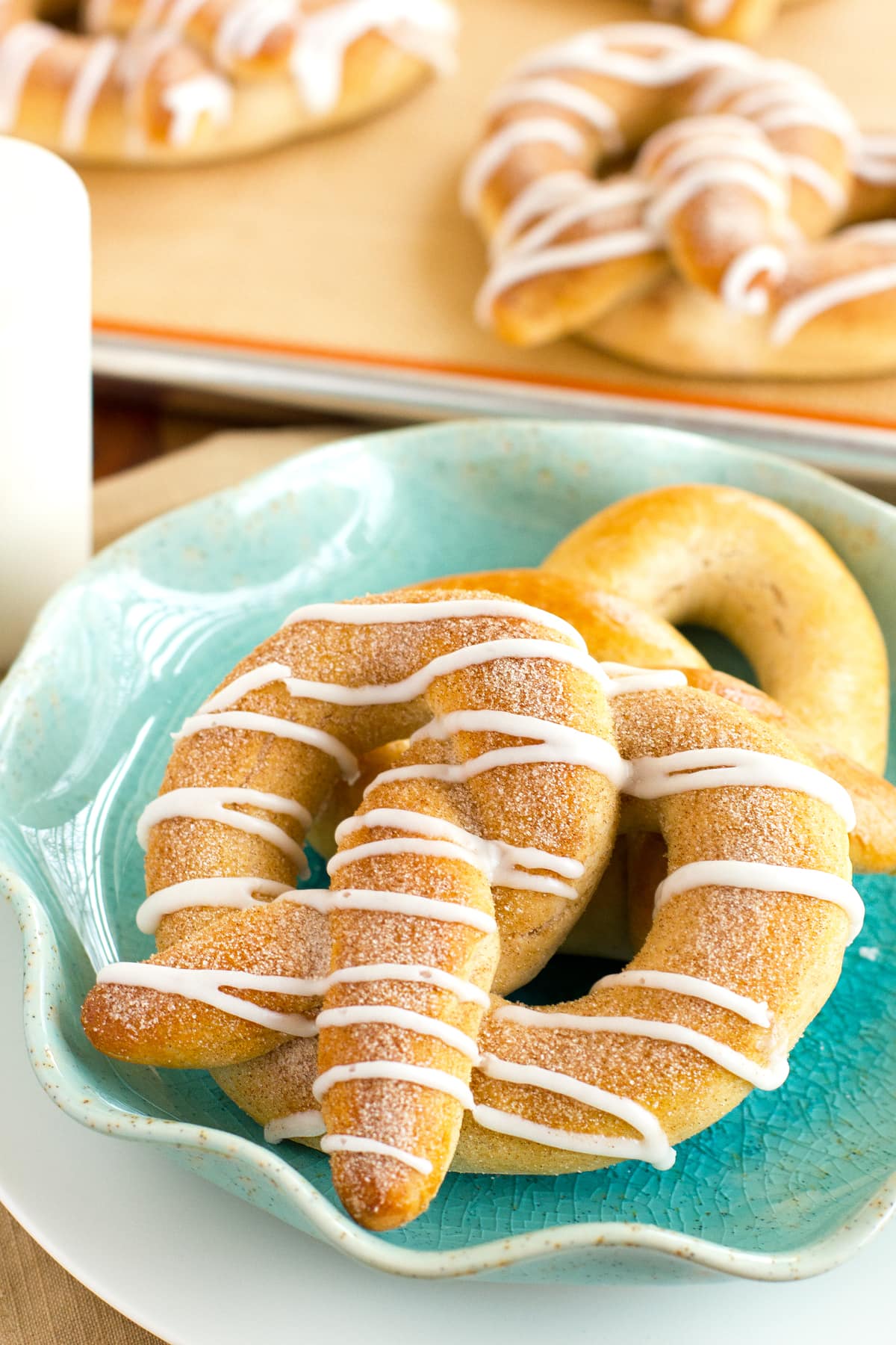 cinnamon pretzels with cinnamon sugar and vanilla glaze