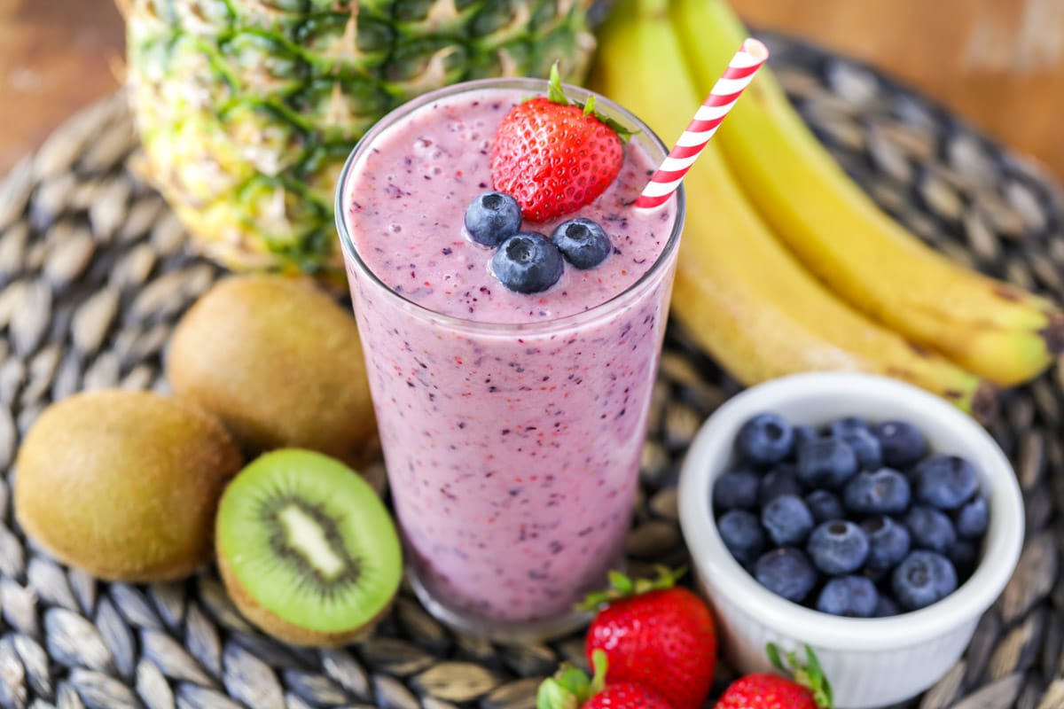 Fruit Smoothie recipe with strawberries and blueberries on top