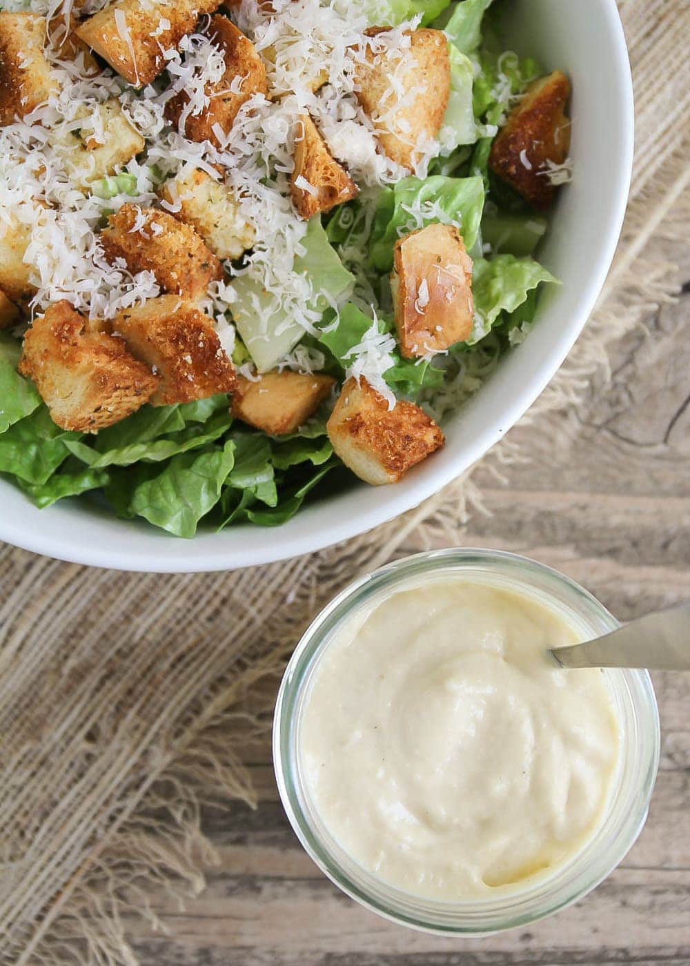 Homemade Caesar Dressing recipe on a caesar salad.