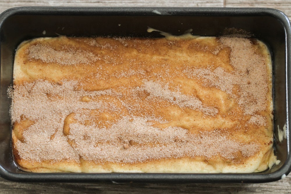 Cream cheese  banana bread batter topped with cinnamon sugar.
