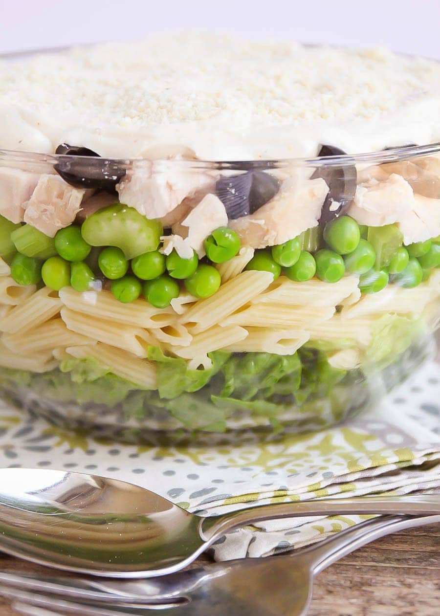 Layer pasta Salad in a glass bowl