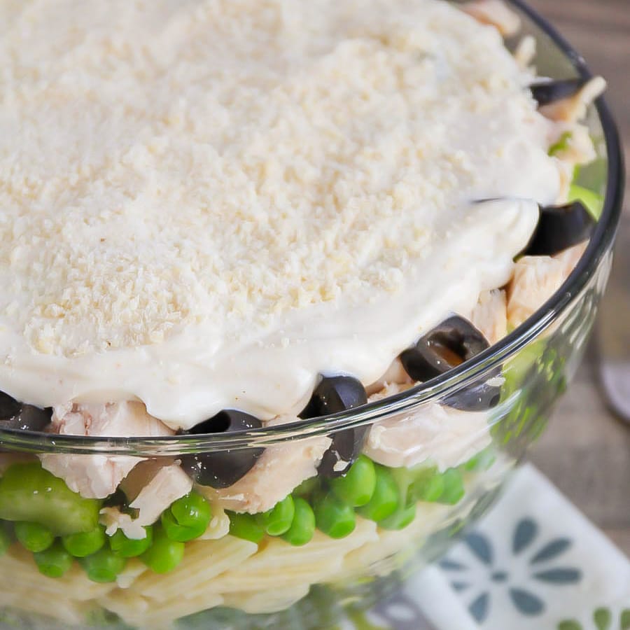 Layered salad with dressing on top