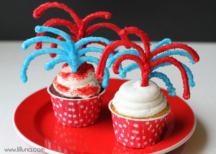 Festive and Cute Candy Fireworks Cupcake Toppers on { lilluna.com } Supplies include candy melts, sprinkles, parchment paper, and a ziploc bag!