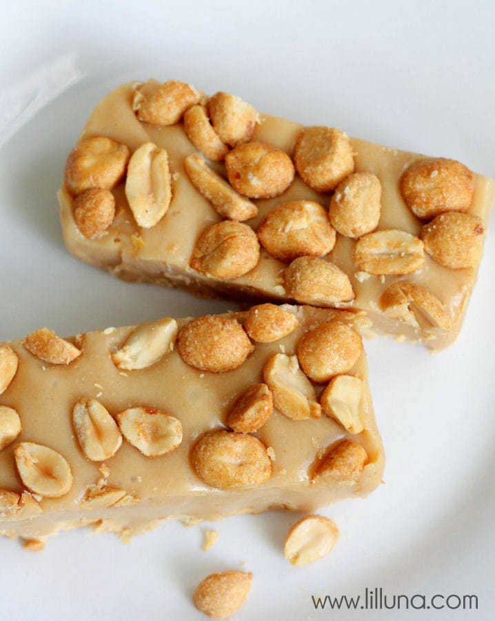 cut homemade pay day bars on a white plate