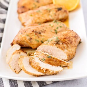 Best chicken marinade grilled chicken on a platter.