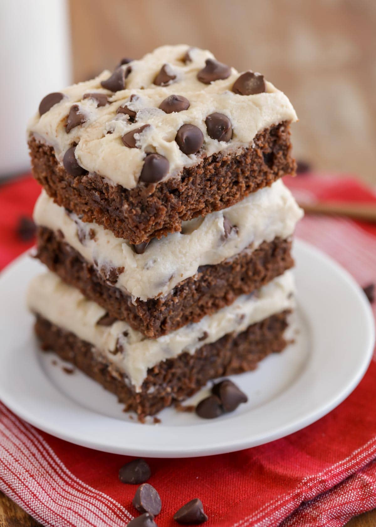 Cookie dough brownies stacked on a plate