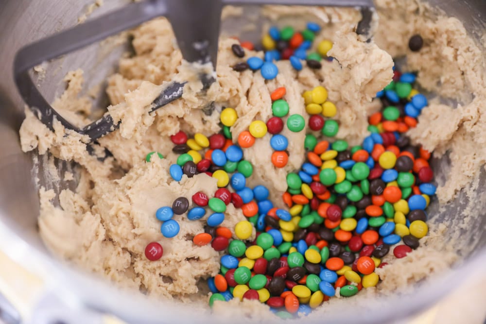 Mixing m&m's into cookie dough using a stand mixer