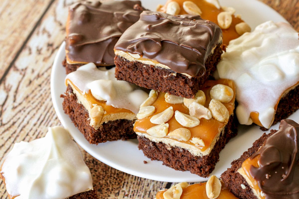 Father's Day Recipes - Snicker's Brownies on a plate served as a Father's Day dessert.