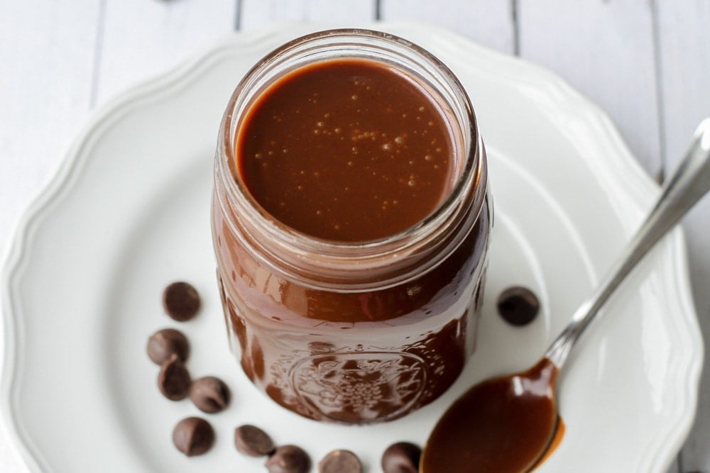 Hot fudge sauce recipe stored in a glass jar.