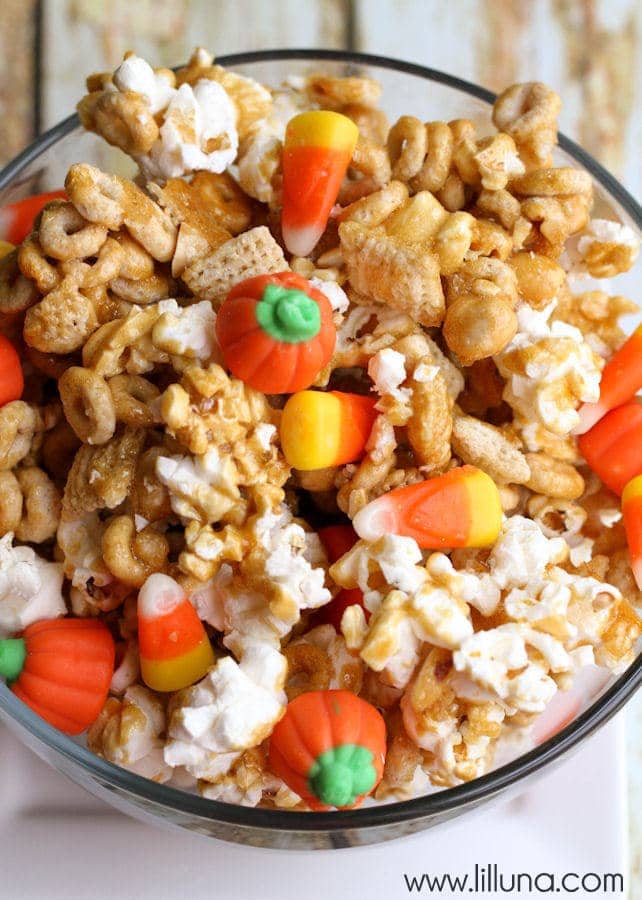 pumpkin party mix in a glass bowl