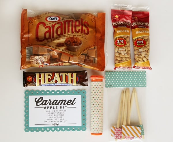 Caramel Apple Kit Gift idea with free print on { lilluna.com } A great gift full of apples, caramels, toppings, lollipop sticks, everything for the yummiest snack!