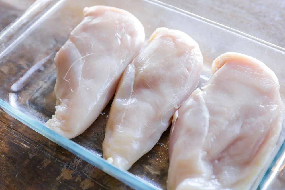 Mayo parm chicken in baking dish