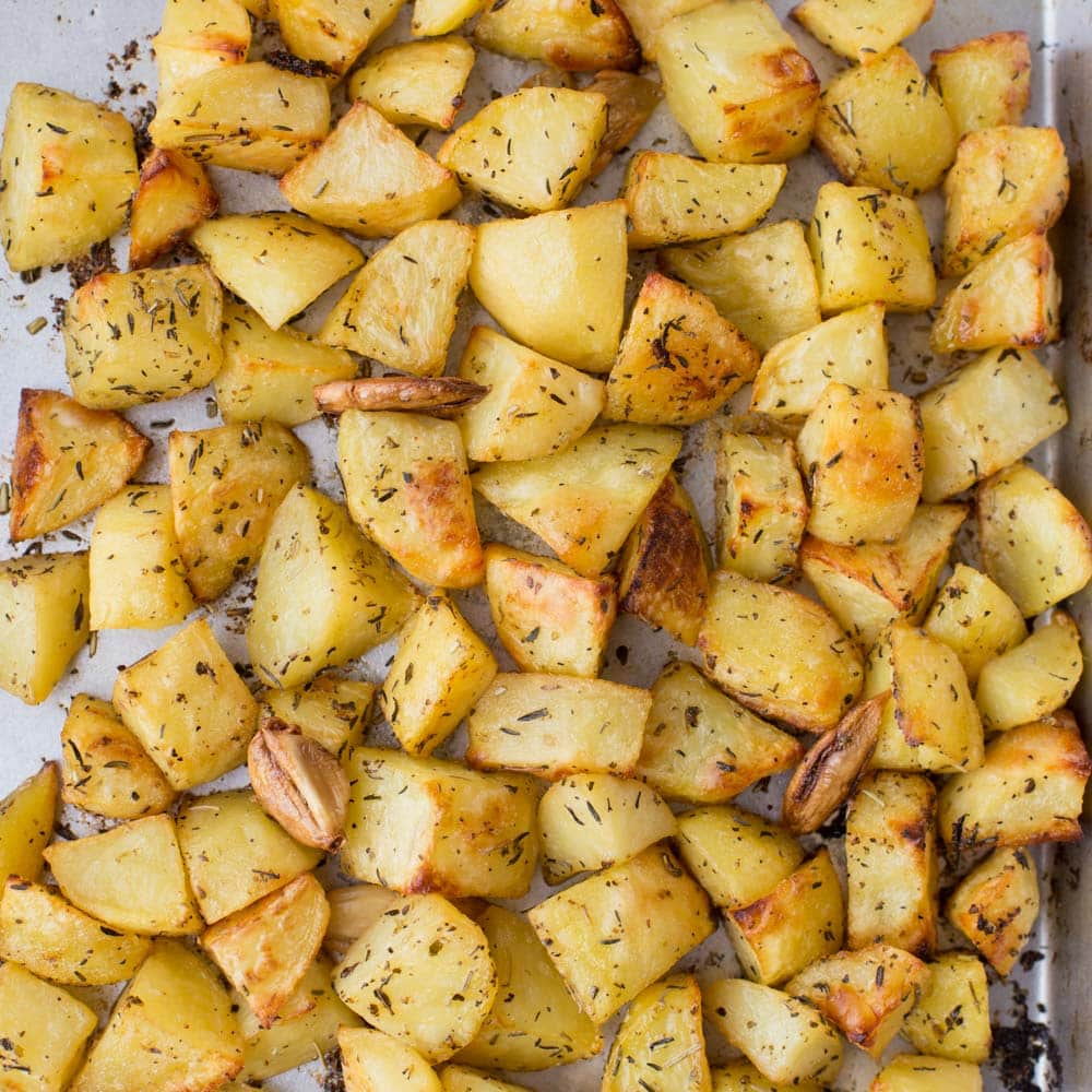 Herb roasted potatoes on baking sheet