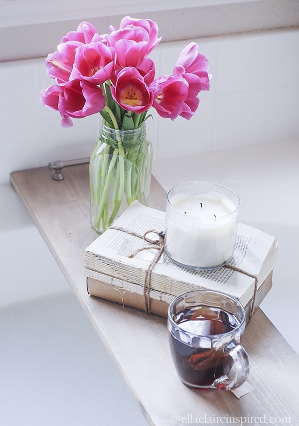 This easy DIY bathtub tray is perfect to hold your drink and your favorite book while you soak! 