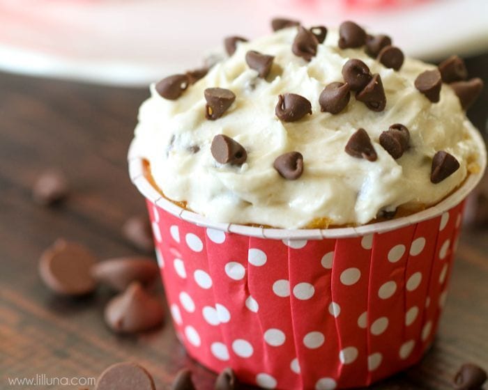 Chocolate Chip Frosting on a cupcake in a red and white polka dot liner