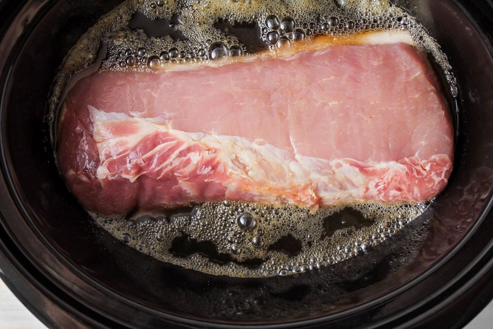 pork barbacoa cooking in the slow cooker