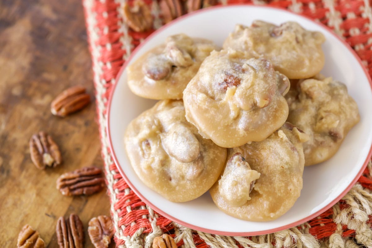 pecan pralines on a white plate