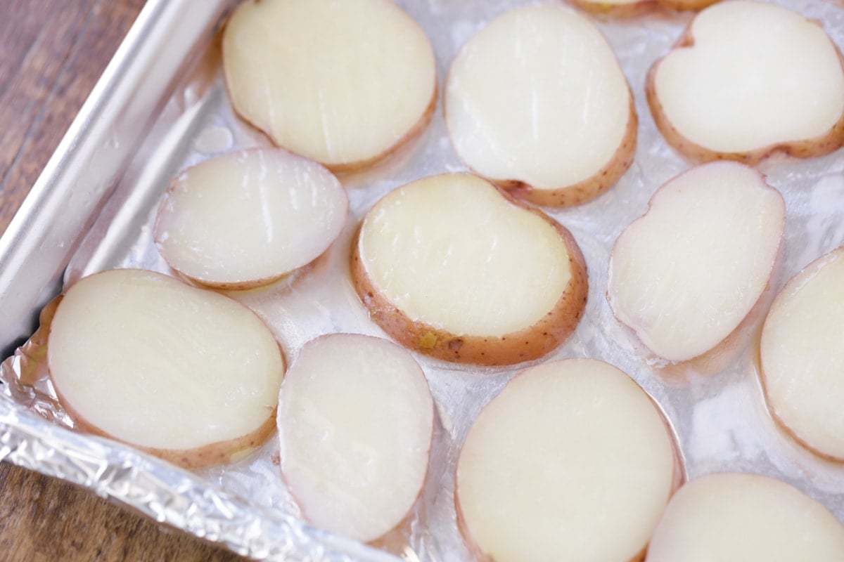 Potato rounds on foil lined sheet