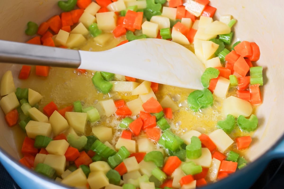 Cooking vegetables in skillet.