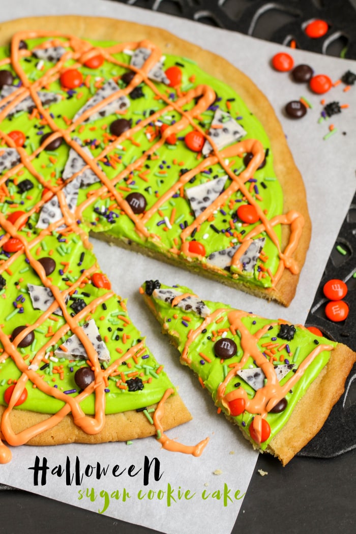 Halloween cookie cake with green frosting and candy