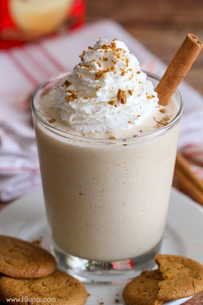 Christmas drink recipes - eggnog milkshake topped with fresh whipped cream.