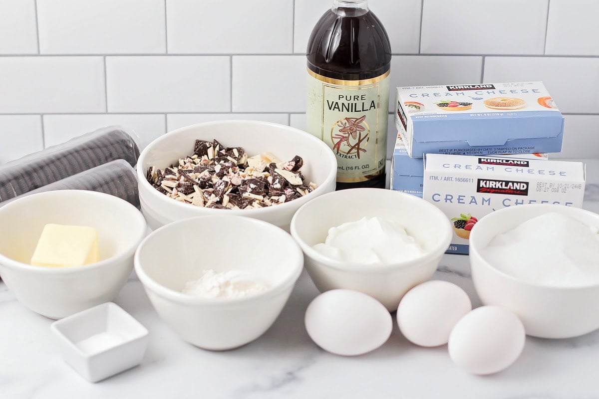 Ingredients for peppermint cheesecake on a kitchen counter.