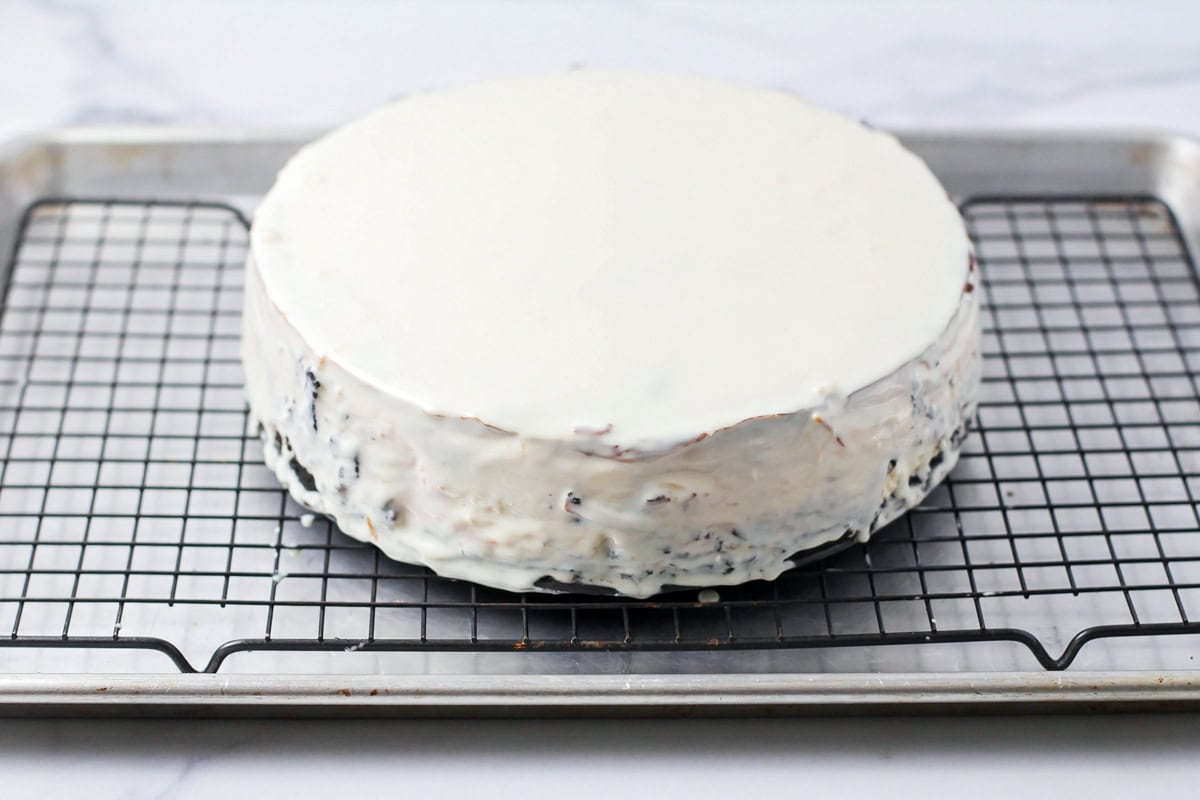 Cheesecake on cooling rack.