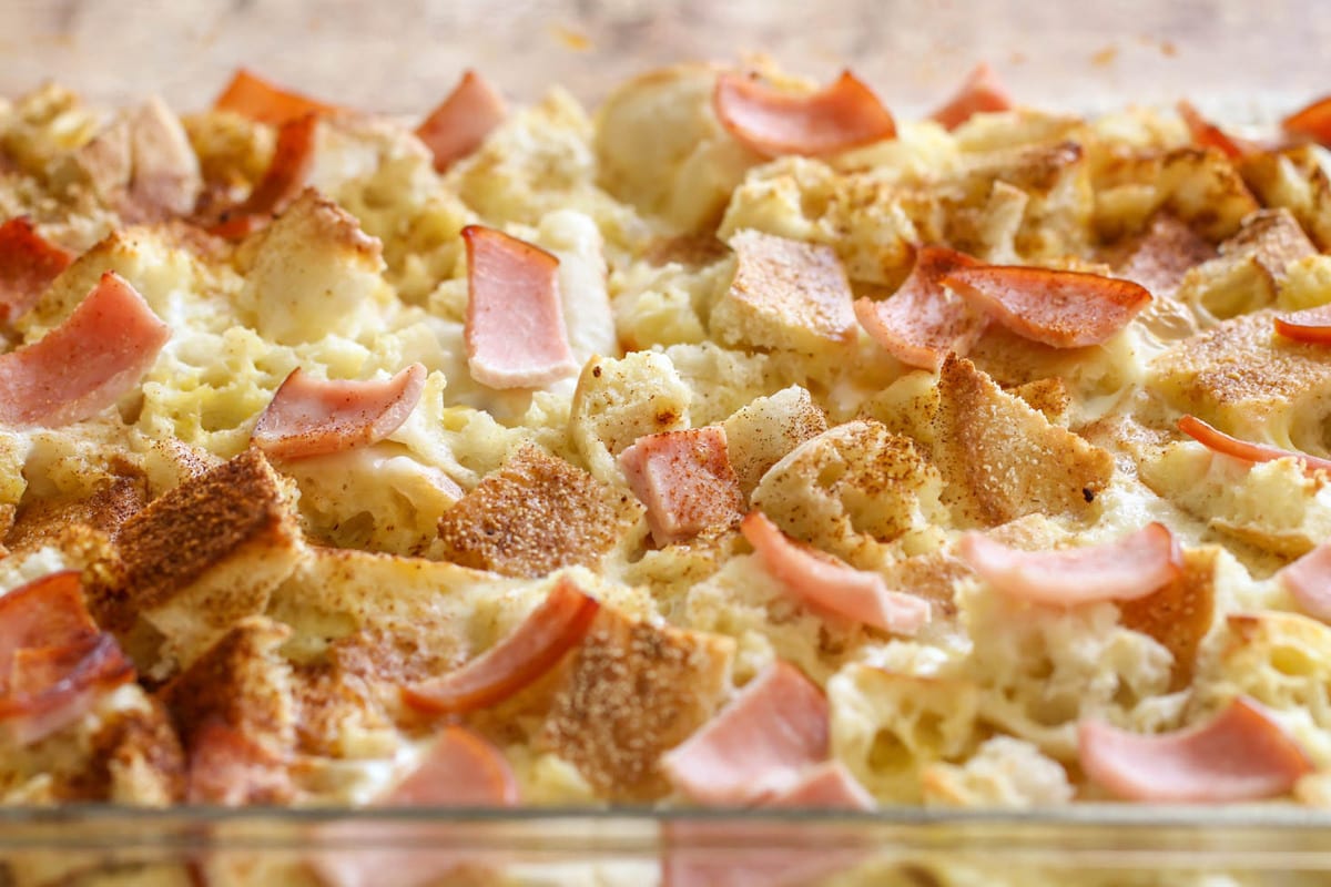 Breakfast casserole recipes - close up of eggs benedict casserole in a baking dish.