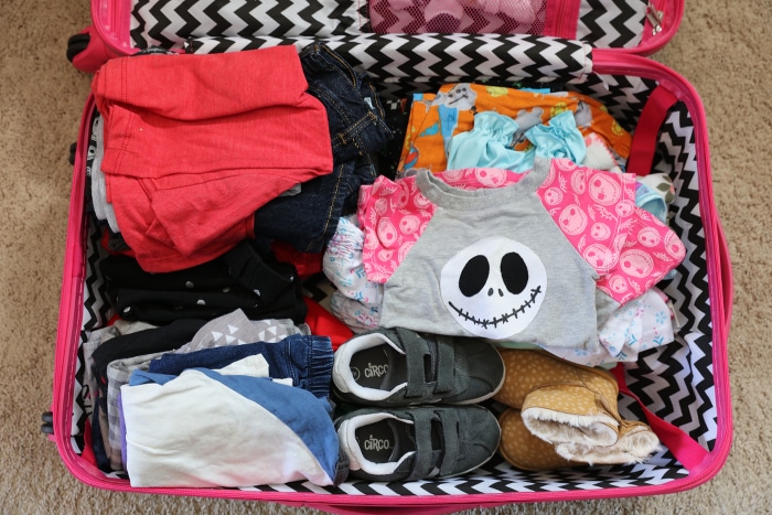 Packing for Disney World - clothes in luggage