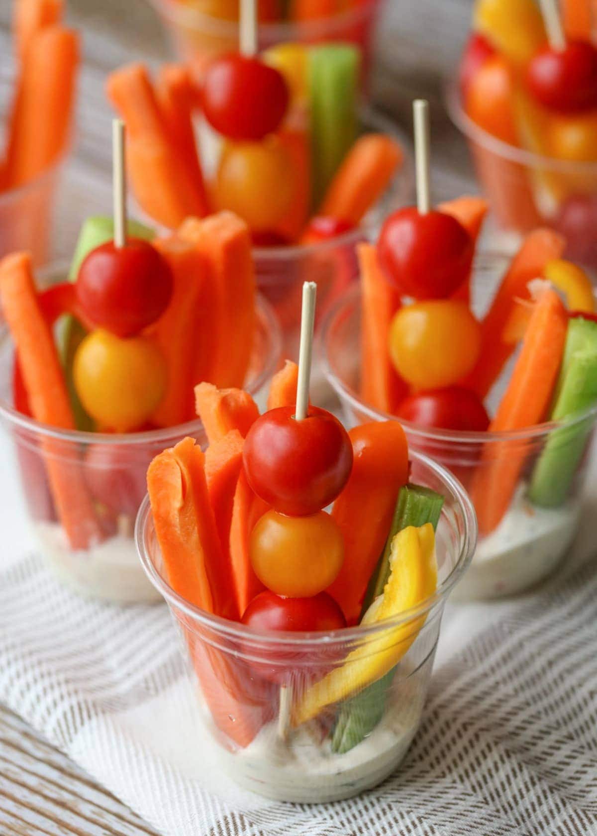 Veggie Cups image with vegetables and dip in a cup.