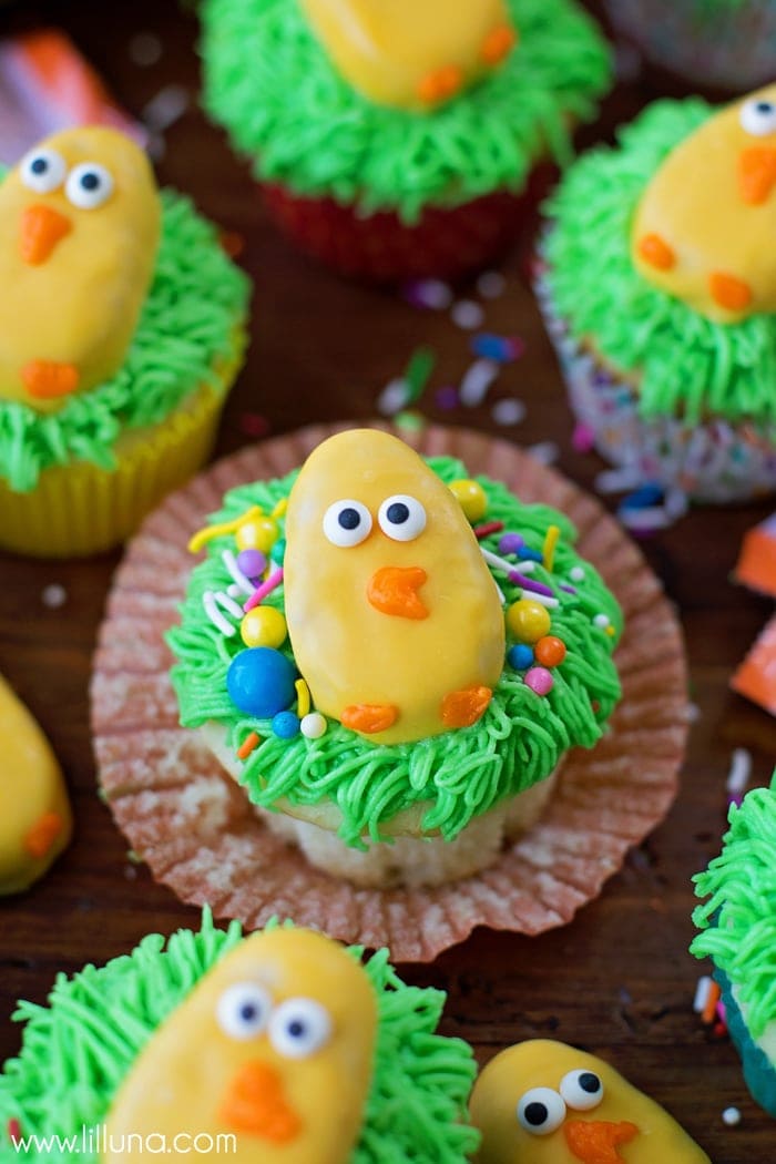 Holiday cakes - easter chick cupcakes decorate with chicks and candy.