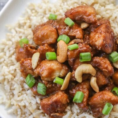 crockpot cashew chicken over rice on plate