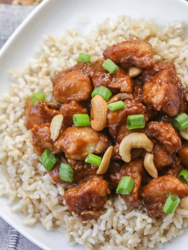 crockpot cashew chicken over rice on plate