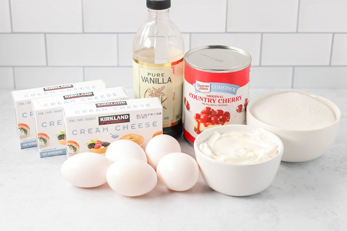 Cheesecake cupcake ingredients on counter.